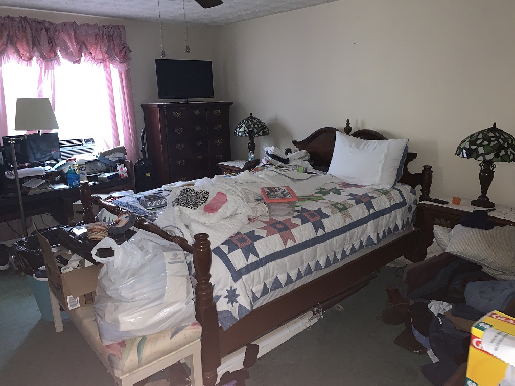 Plumosa Home atlantic property solutions of florida masters bedroom area