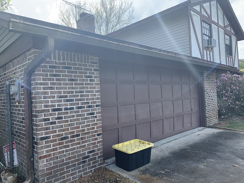 Plumosa Home atlantic property solutions of florida outside garage