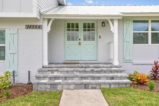 Plumosa Vacation Rental atlantic property solutions of florida frontview entrance